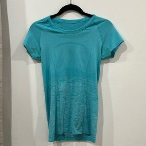 Teal lulemon athletic shirt!